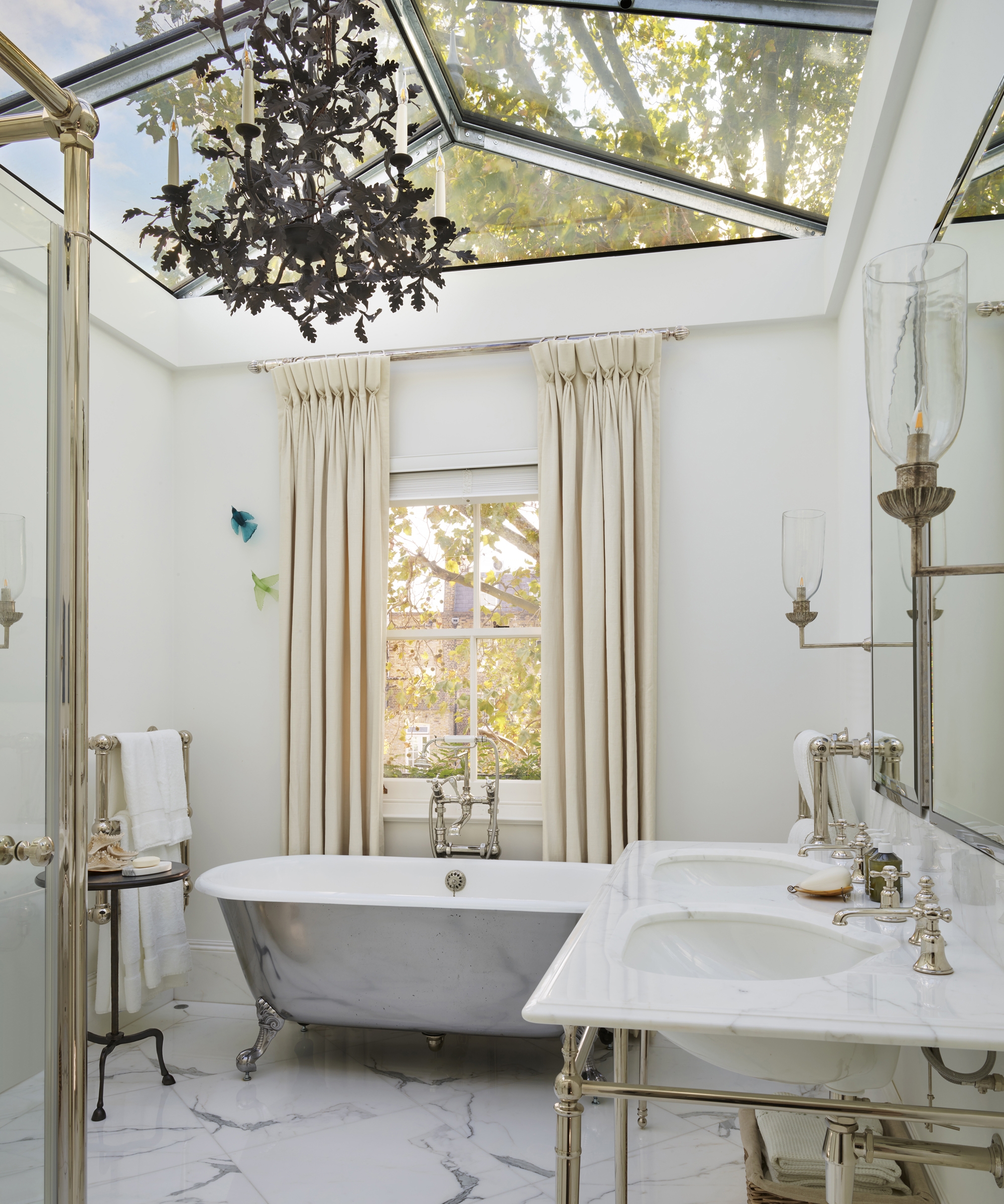 Chandelier featuring Leaf Motif and Gabled Skylight Detail