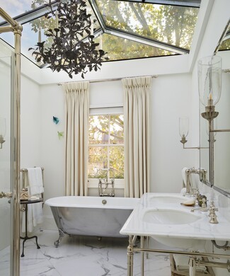 Chandelier featuring Leaf Motif and Gabled Skylight Detail