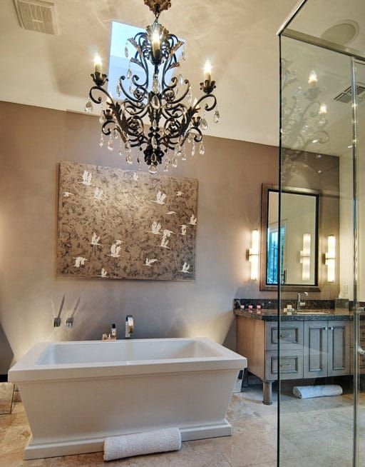 Chandelier featuring Ornate Scrollwork and Skylight Placement