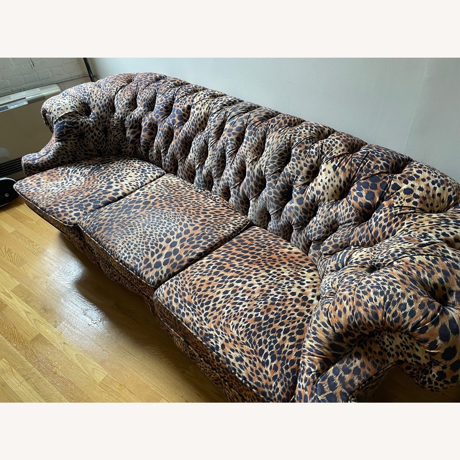 Chesterfield Sofa: Cheetah Print Bold Statement Seating Piece