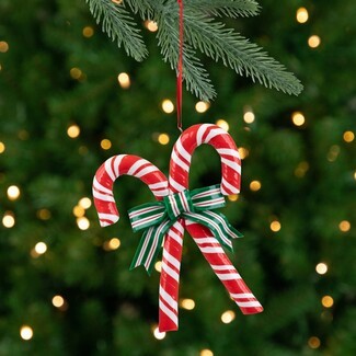 Christmas Ornament: Crossed Candy Canes and Striped Bow Accent