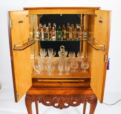 Cocktail Cabinet in Burr Walnut Grain with Ornate Carved Base