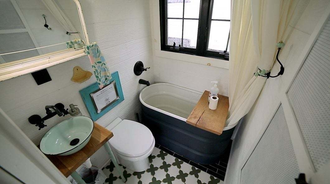 Compact Bathroom: Geometric Tile Mint Green Vessel Sink