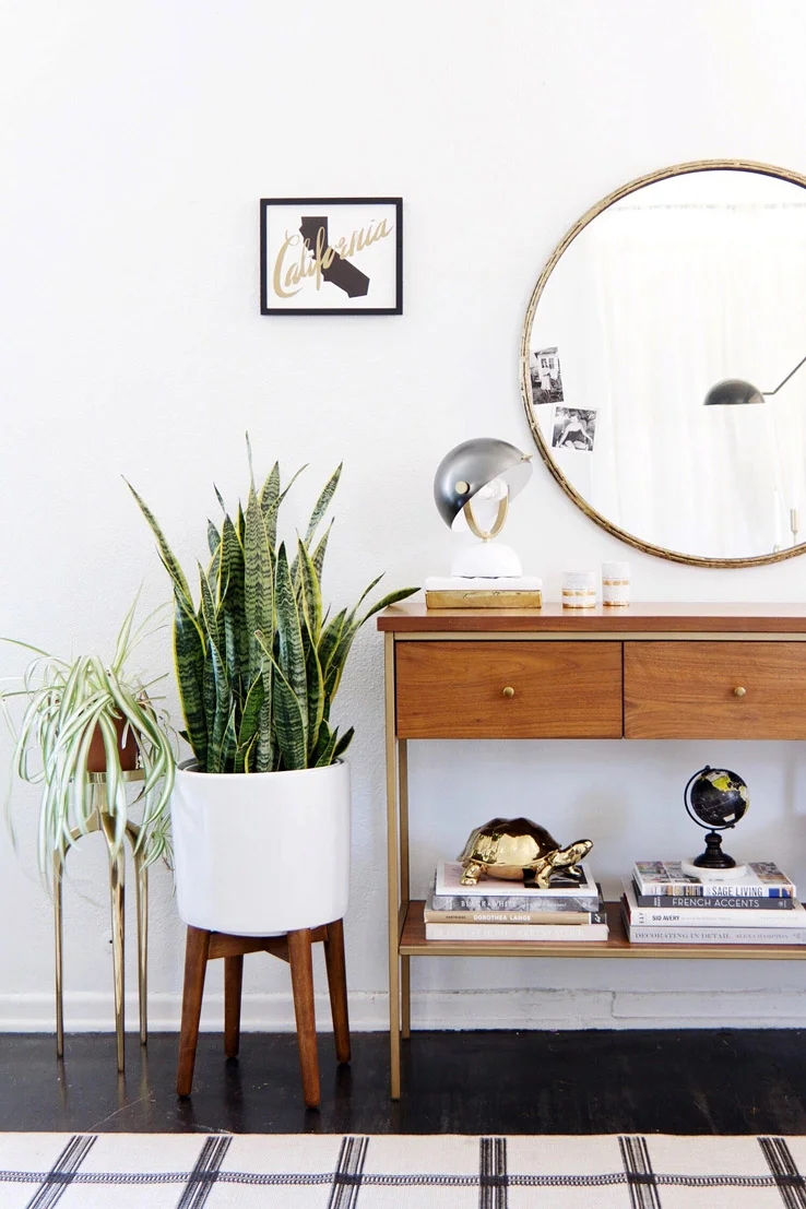 Console Table featuring Gold Metal Frame and Walnut Drawers