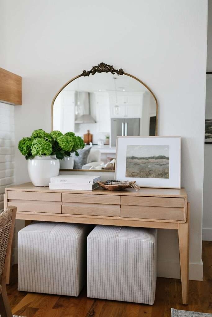 Console Table with Arched Crest Mirror and Cube Ottomans