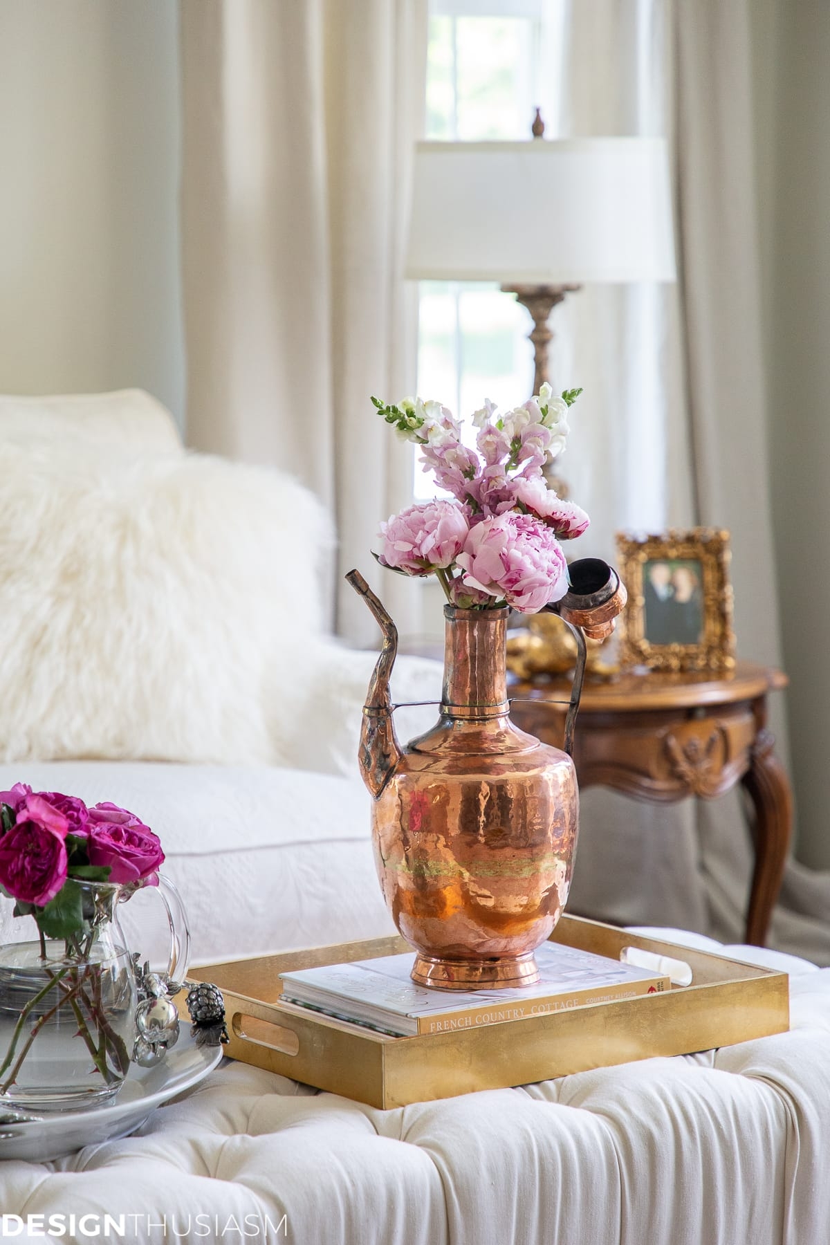Copper Pitcher on Tufted Ottoman with Blush Pink Living Decor