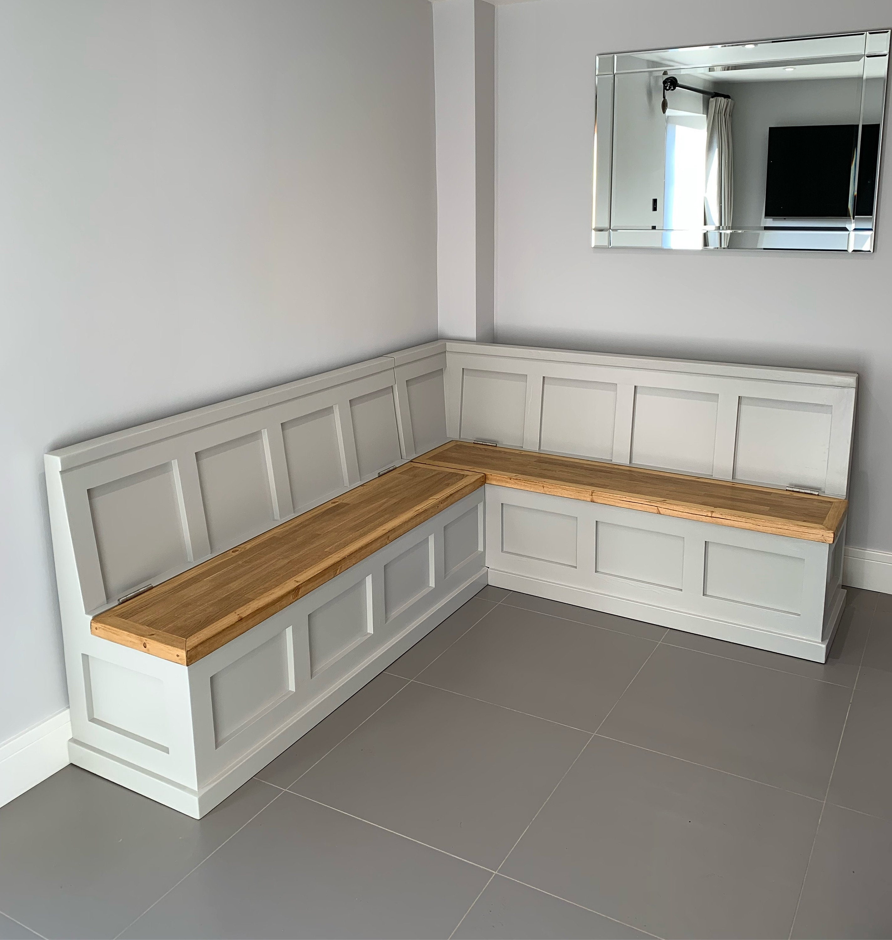 Corner Banquette: Light Gray Hinged Storage Recessed Panels