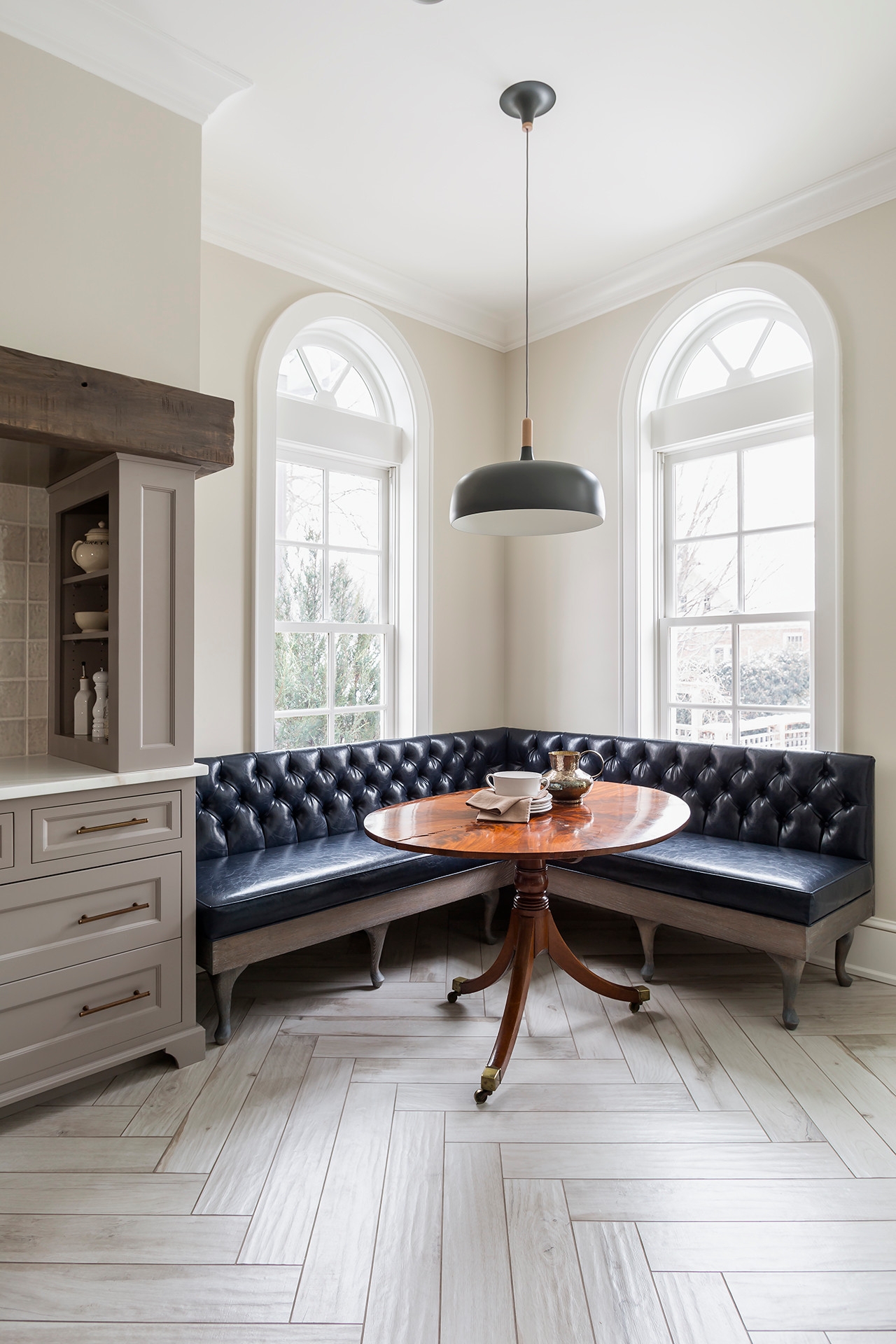 Corner Banquette with Navy Blue Diamond Button Tufting for Dining Nooks