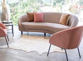Curved Sofa: Dusty Rose Accents Taupe Velvet Seating Arrangement