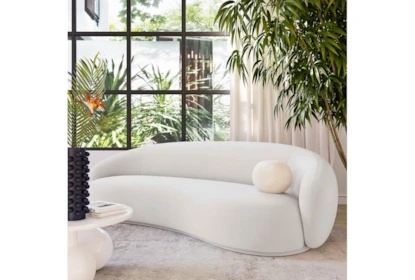 Curved Sofa: Sculptural Sofa Styling with Spherical Pillow
