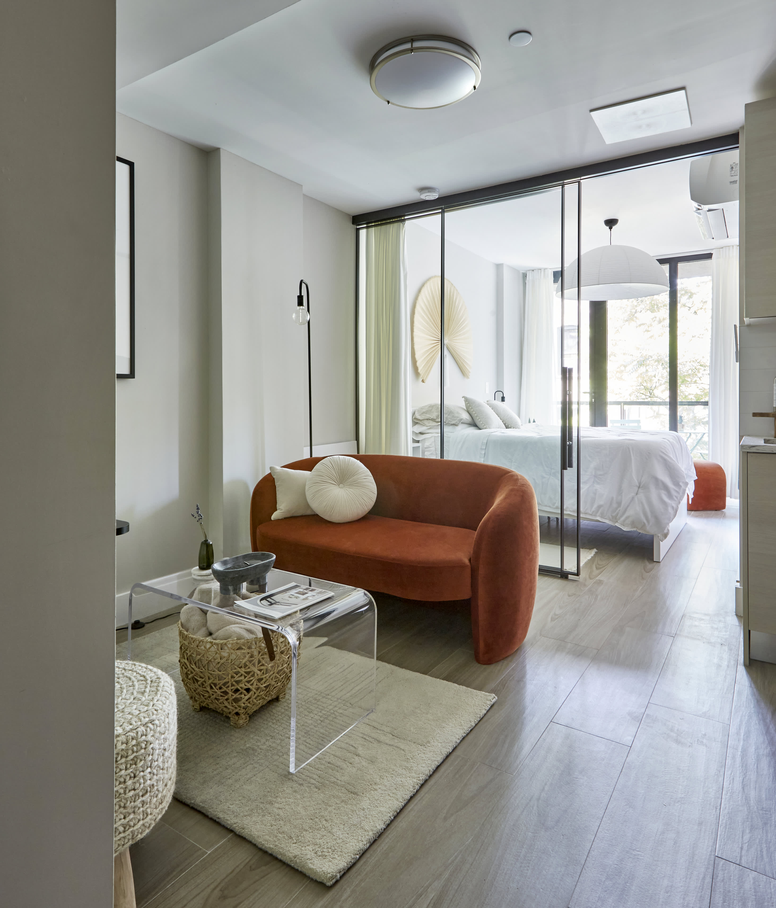 Curved Sofa Terracotta Velvet Studio Glass Partition Idea