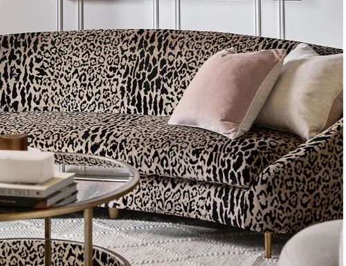 Curved Sofa with Gold Legs Glamorous Leopard Shell Design