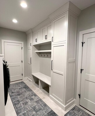 Custom Mudroom Cabinets: Off-White Floor to Ceiling Storage