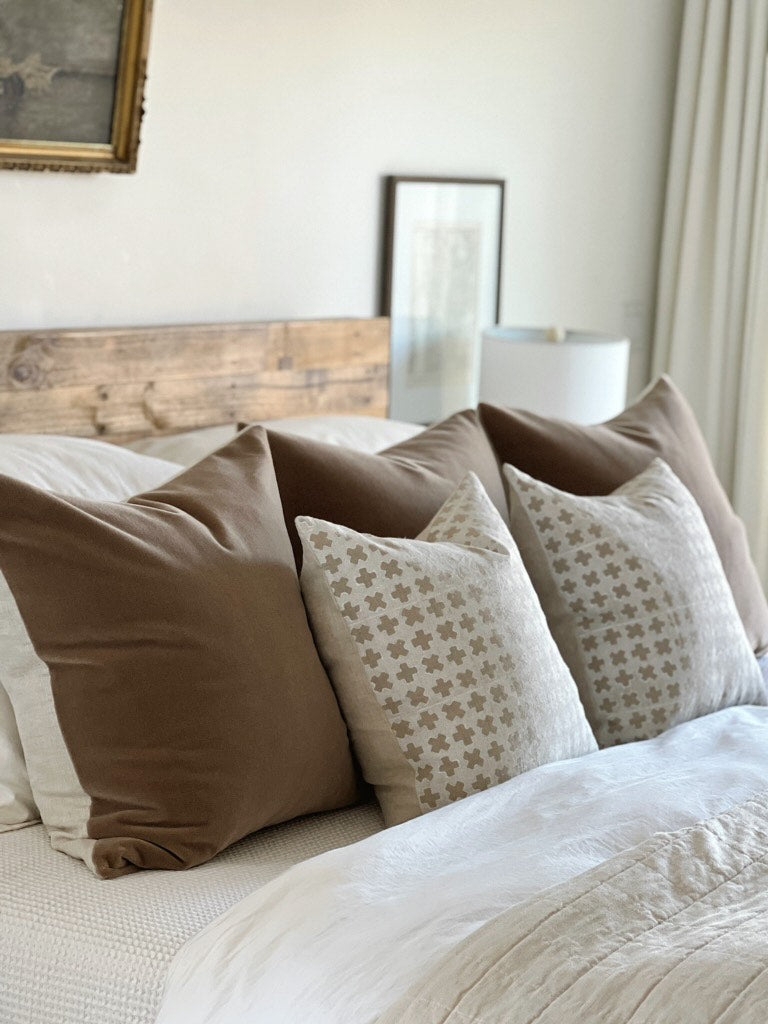 Decorative Pillow: Geometric Cross Print Creamy White Bed