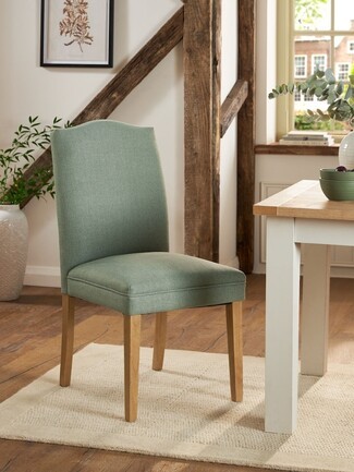 Dining Chair: Arched Backrest and Tapered Wooden Legs