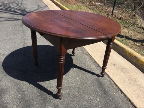Dining Table with Caster Wheels and Split Top Wood Design