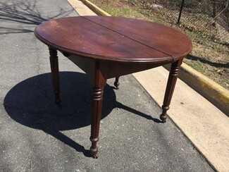 Dining Table with Caster Wheels and Split Top Wood Design