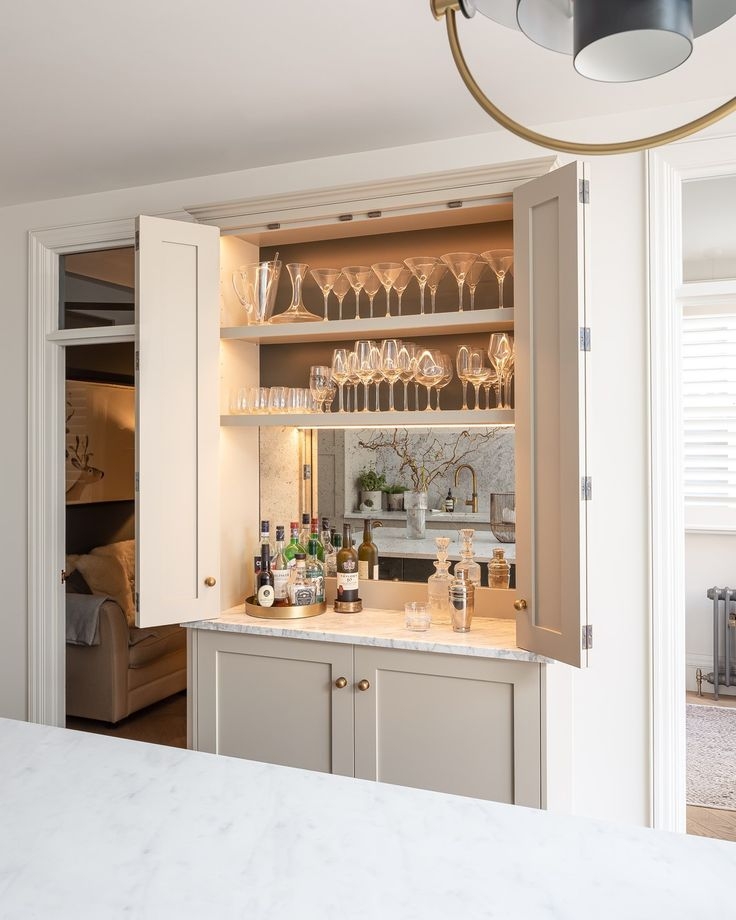 Drinks Cabinet with Mirrored Backsplash and Built In Niche