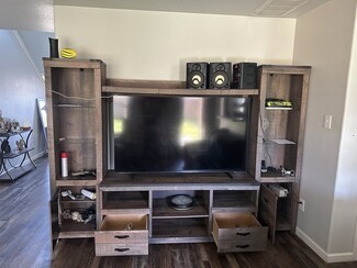 Entertainment Center: Metal Corner Accents Weathered Wood Unit