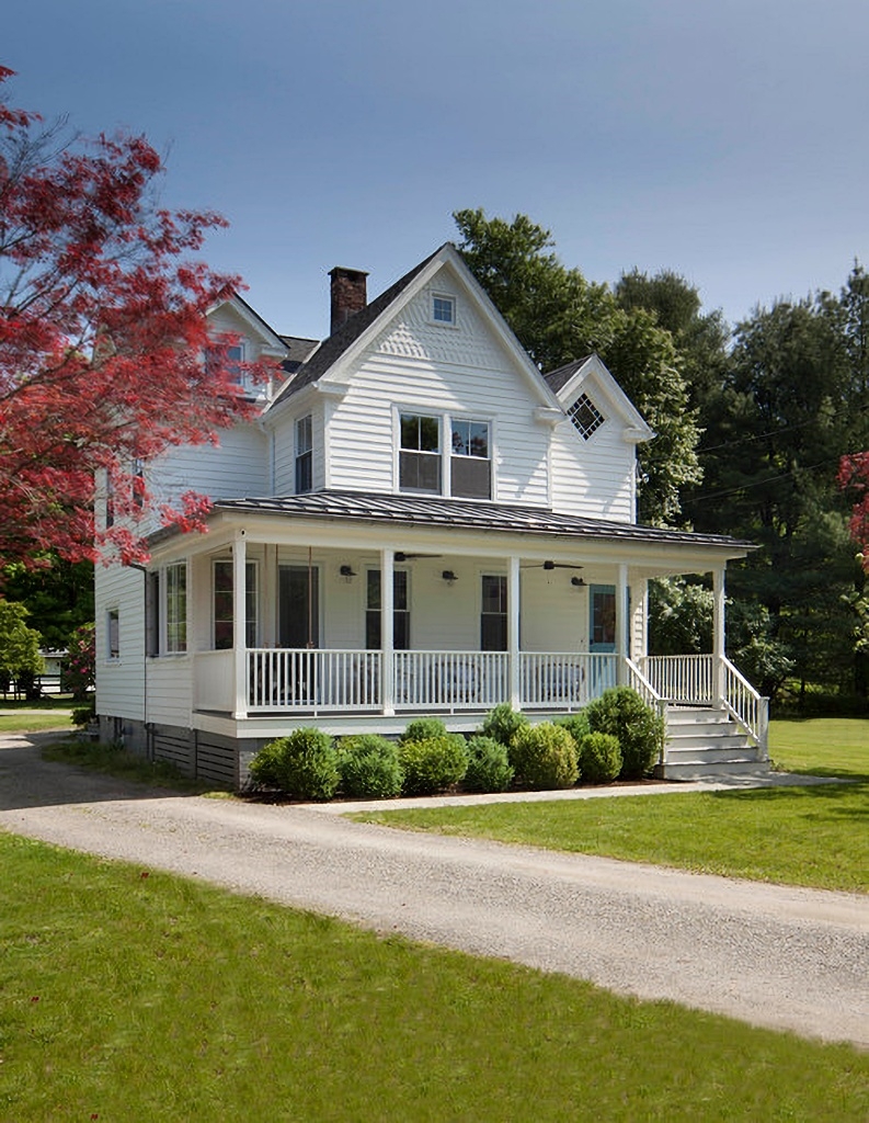 Farmhouse Exterior Wraparound Porch: Scandinavian farmhouse exterior.