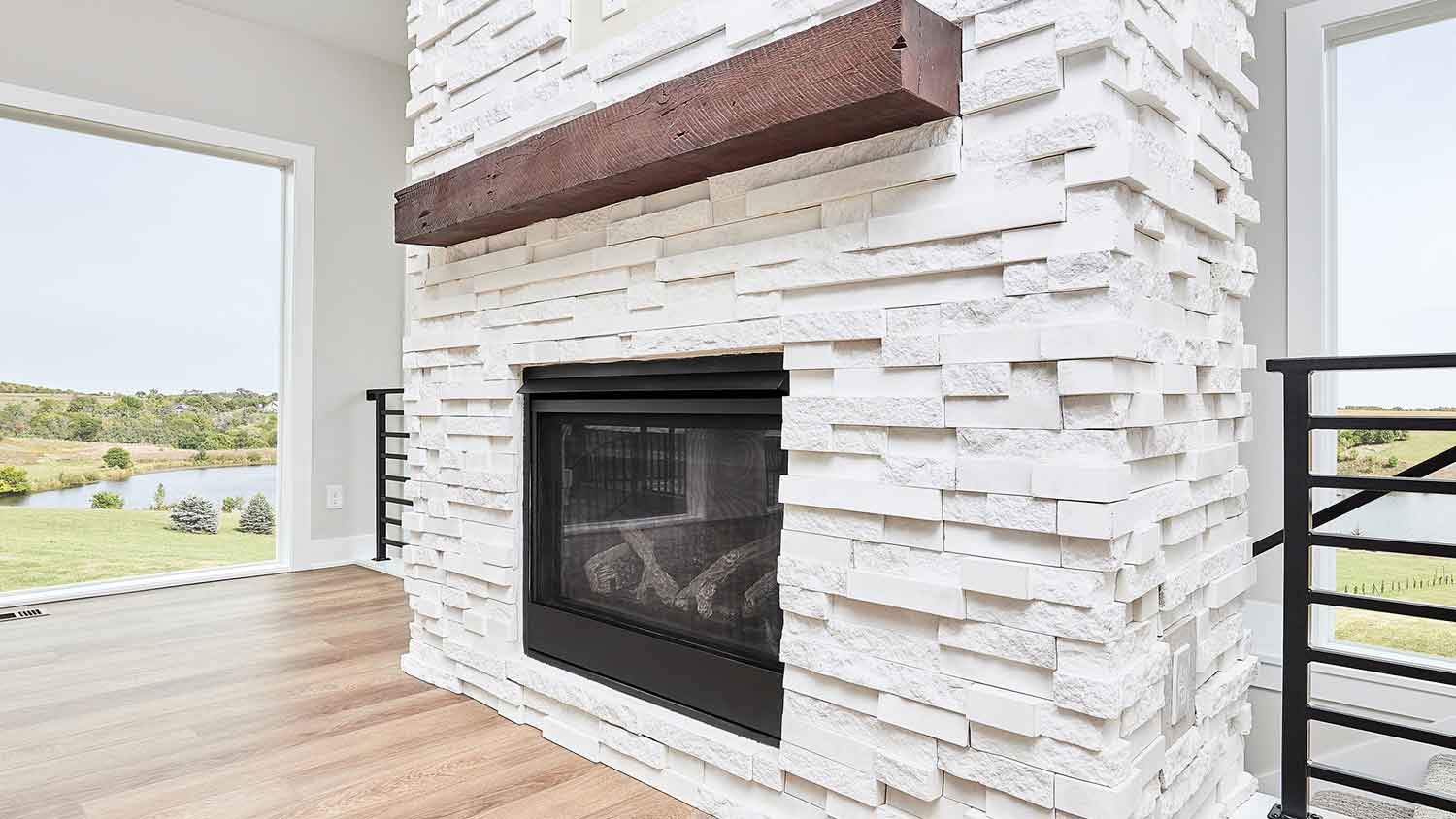 Fireplace Bright White Stacked Stone and Chunky Mantel