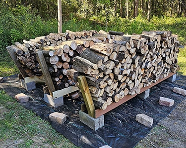Firewood Rack Cinder Block Base Angled Supports Rustic Wood Rack