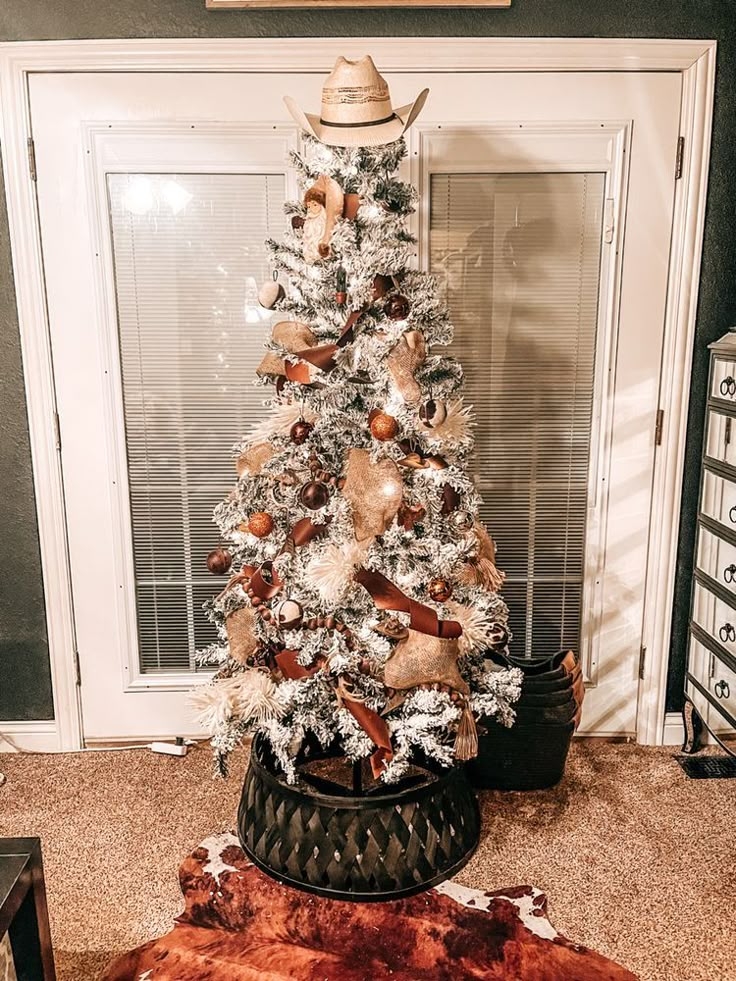Flocked Christmas Tree with Cowhide Rug Base and Cowboy Hat Topper