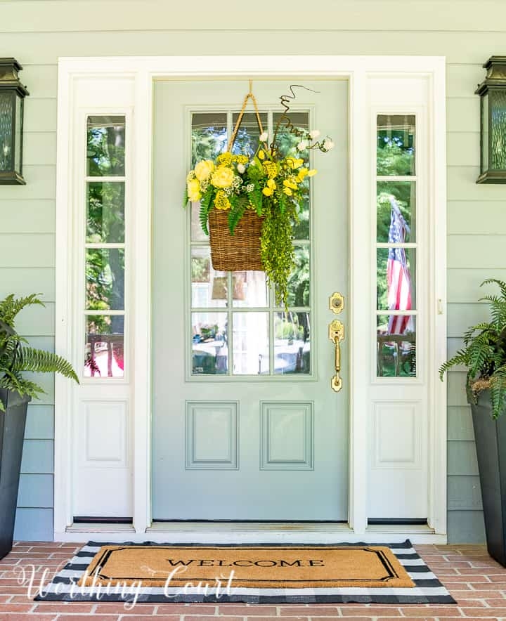 Front Door in Seafoam Green With Wicker Rattan Hanging Basket