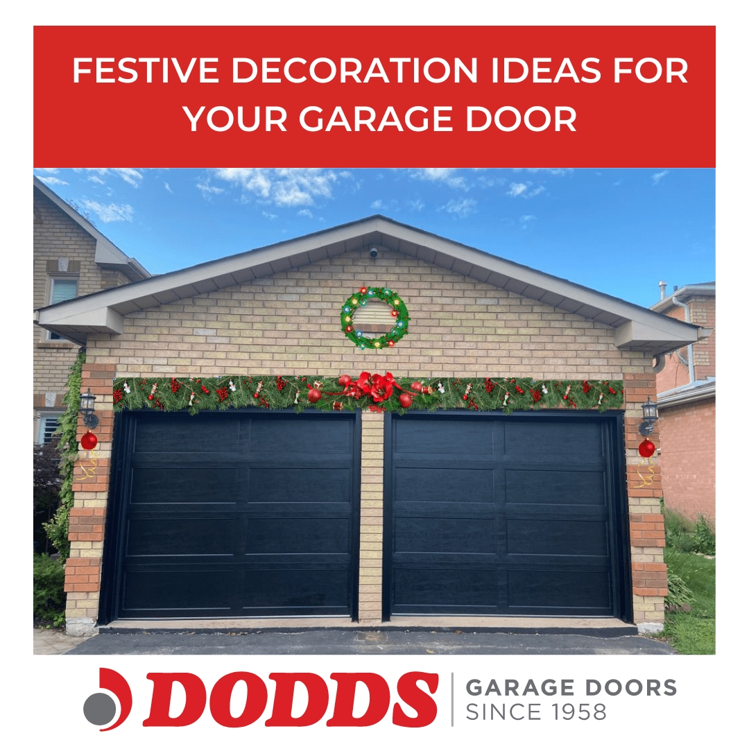 Garage Door Matte Black Panels with Full Width Pine Garland Decor