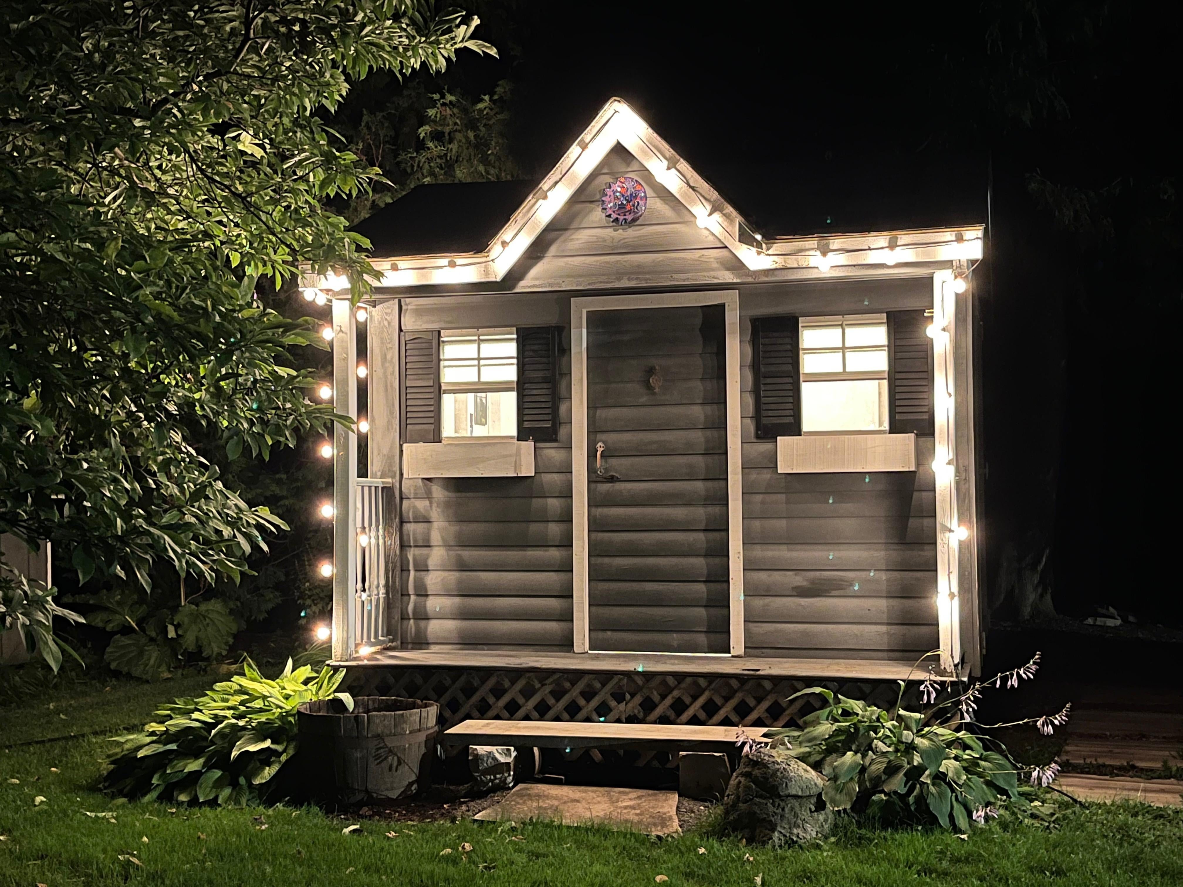 Garden Shed featuring Globe String Lights and Planter Boxes