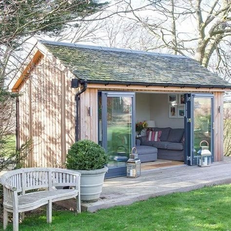 Garden Shed with Bi-fold Glass Doors and Vertical Cladding
