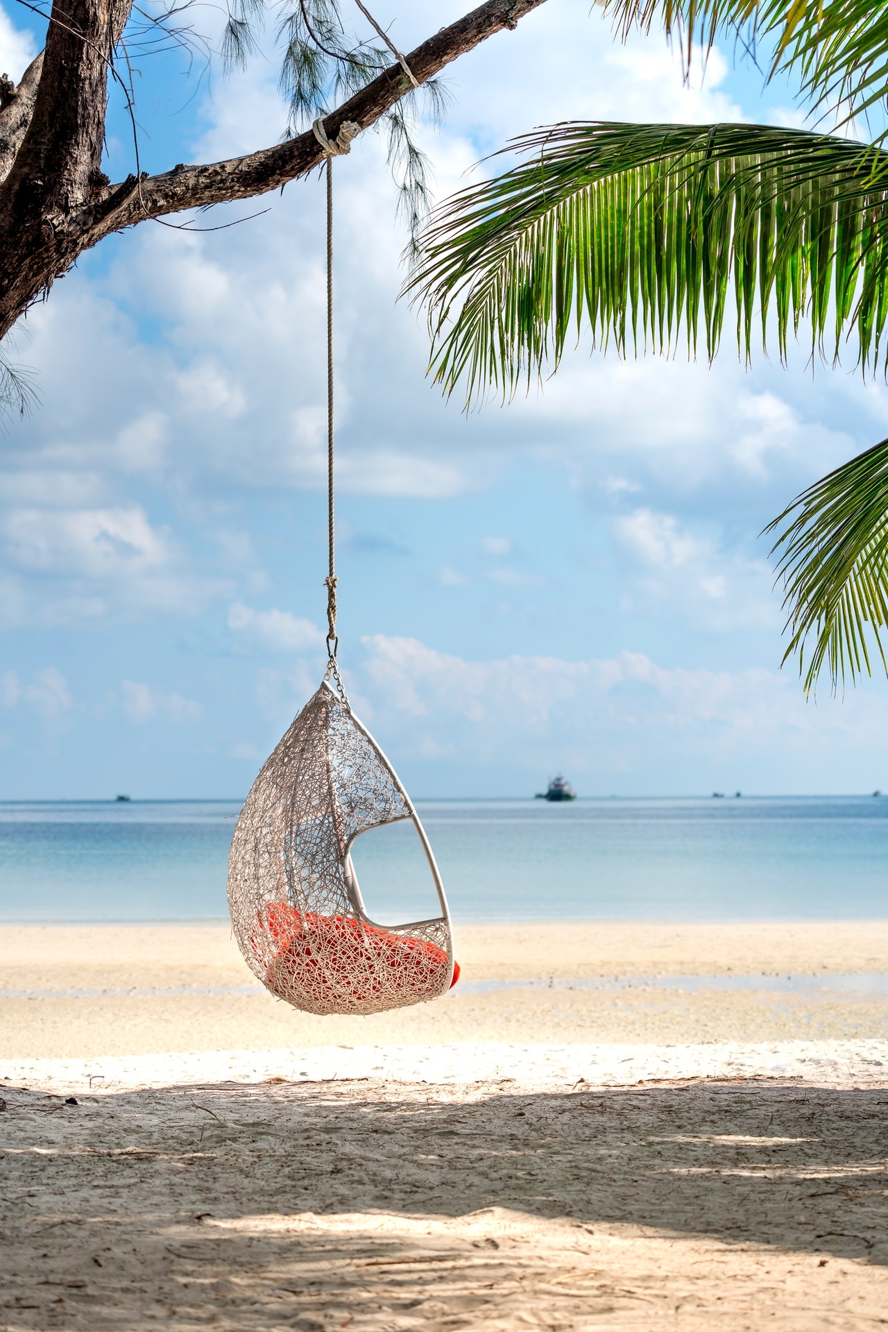 Hanging Swing Chair With Teardrop Shape and Open Weave