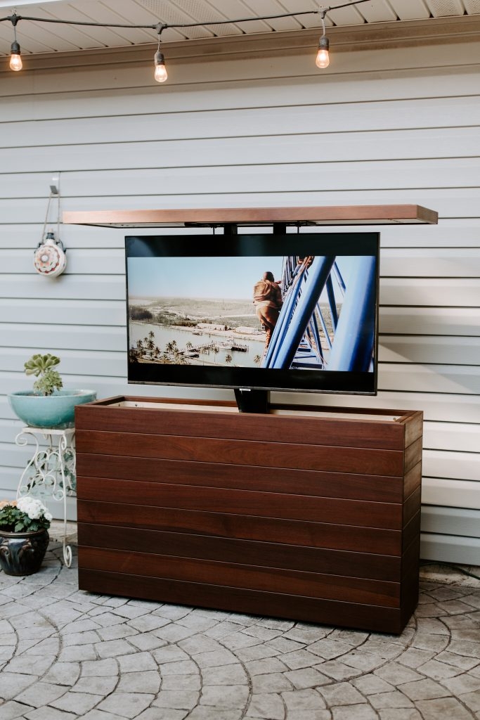 Hidden Outdoor TV Lift Cabinet System Built with Ipe Hardwood