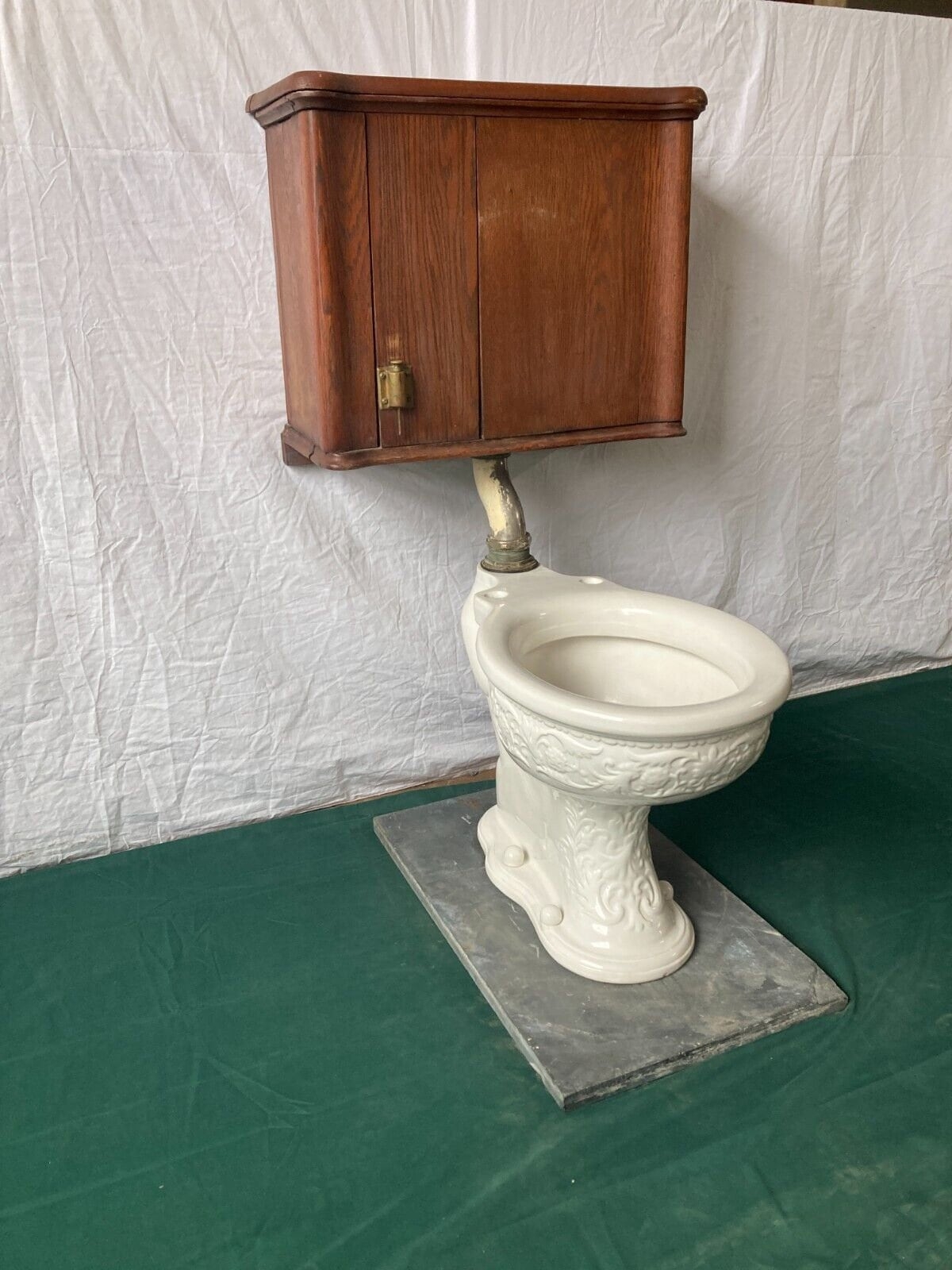 High Tank Toilet includes Embossed Relief and Victorian Wooden Cistern