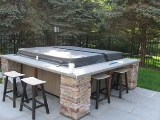Hot Tub Bar: Stacked Stone Pillars Stone Veneer Counter