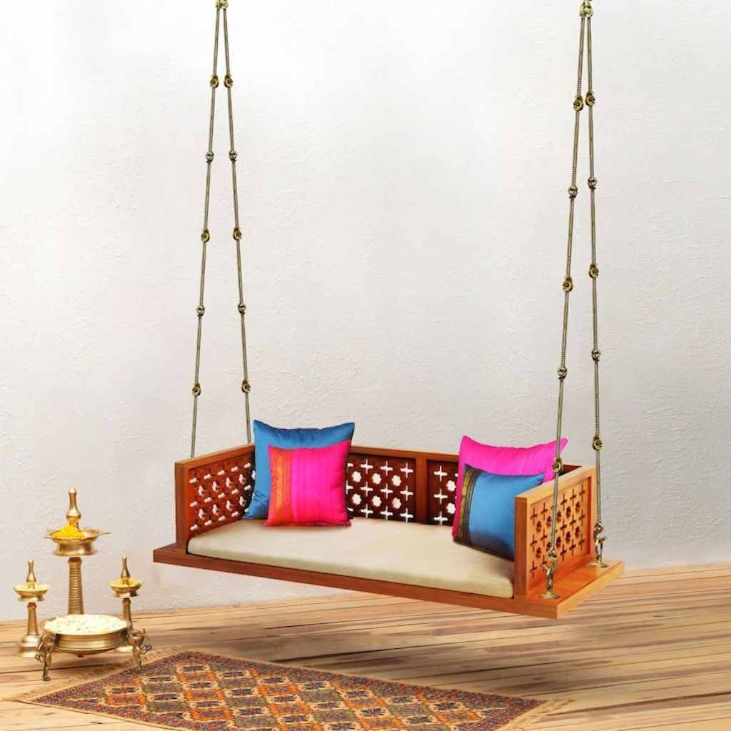 Indian Swing Featuring Lattice Cutout Panels and Brass