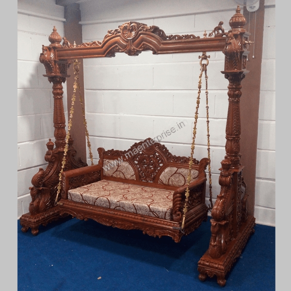 Indoor Swing With Intricate Carvings and Ornate Pillars