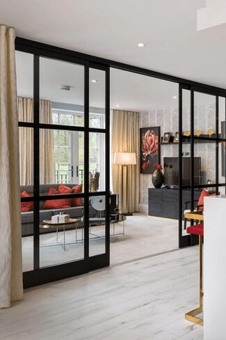 Internal Glass Partition: Matte Black Gridded Sliding Door Wall