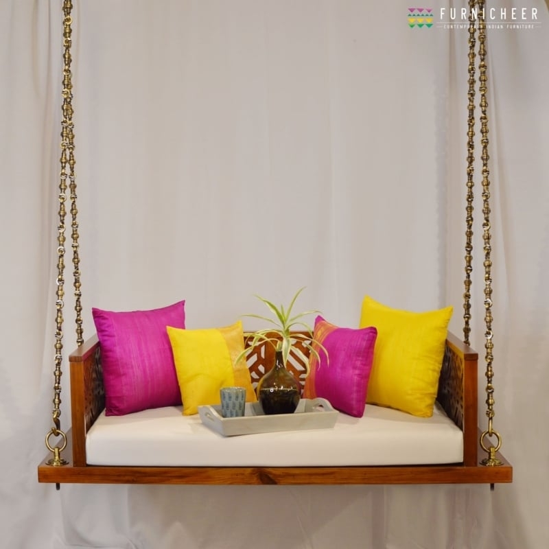 Jhoola Swing With Carved Latticework and Silk Pillows