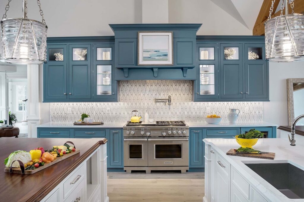 Kitchen Cabinetry: Deep Teal Finish with Coastal Art