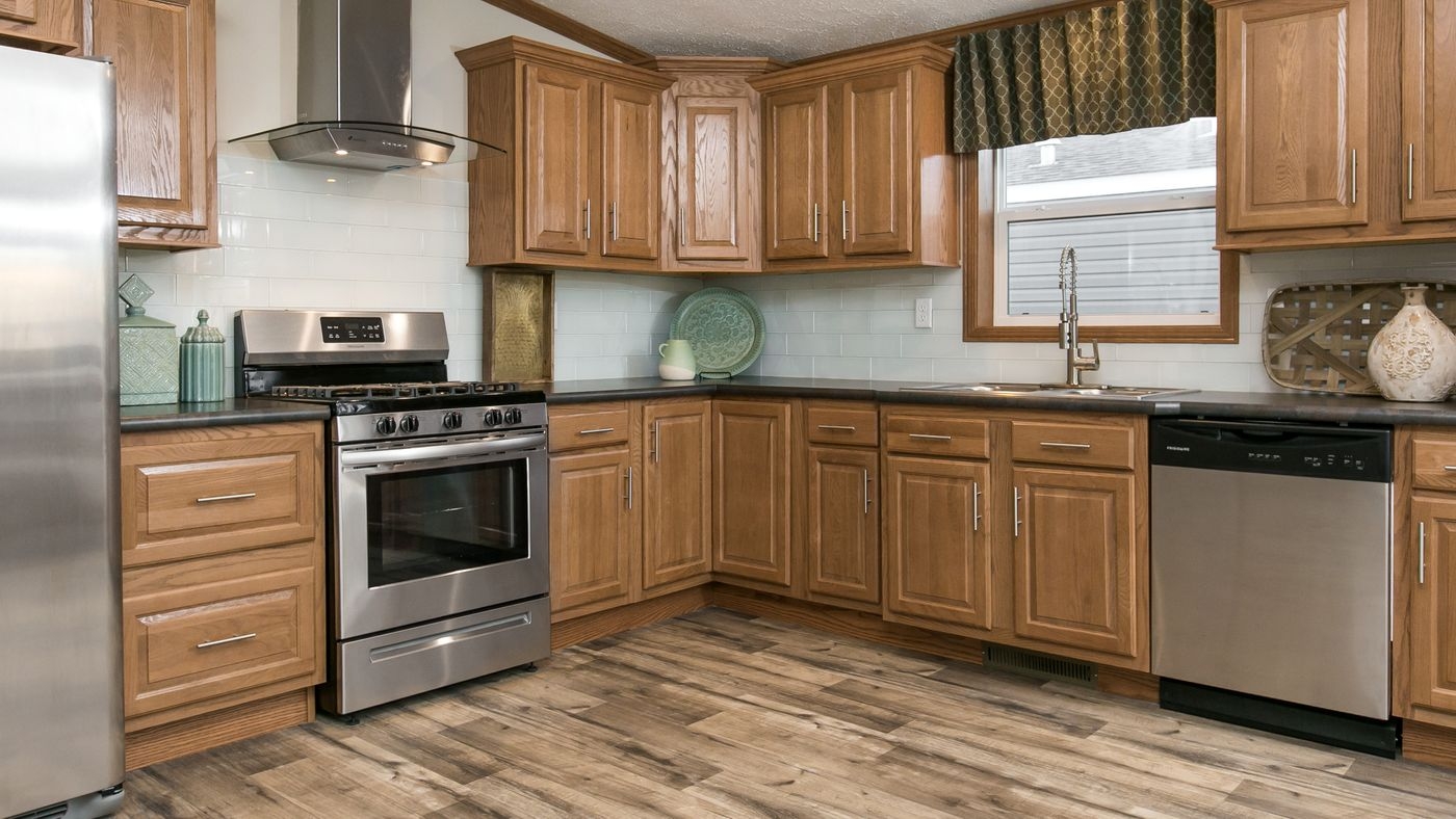 Kitchen Cabinetry: Honey Oak Recessed Panel L-Shape
