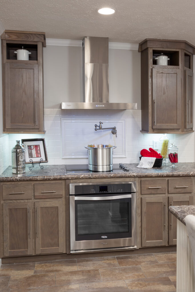 Kitchen Cabinetry: Weathered Wood with Pot Filler