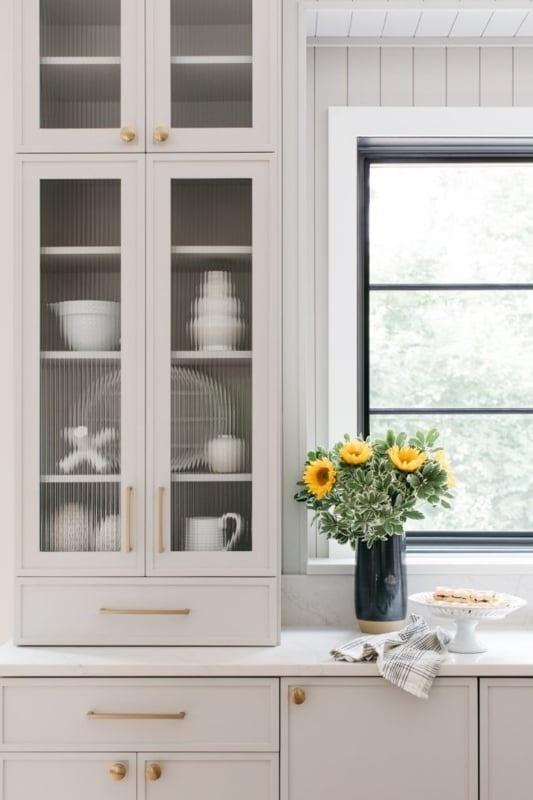 Kitchen Cabinetry with Brass Hardware Shaker Pantry