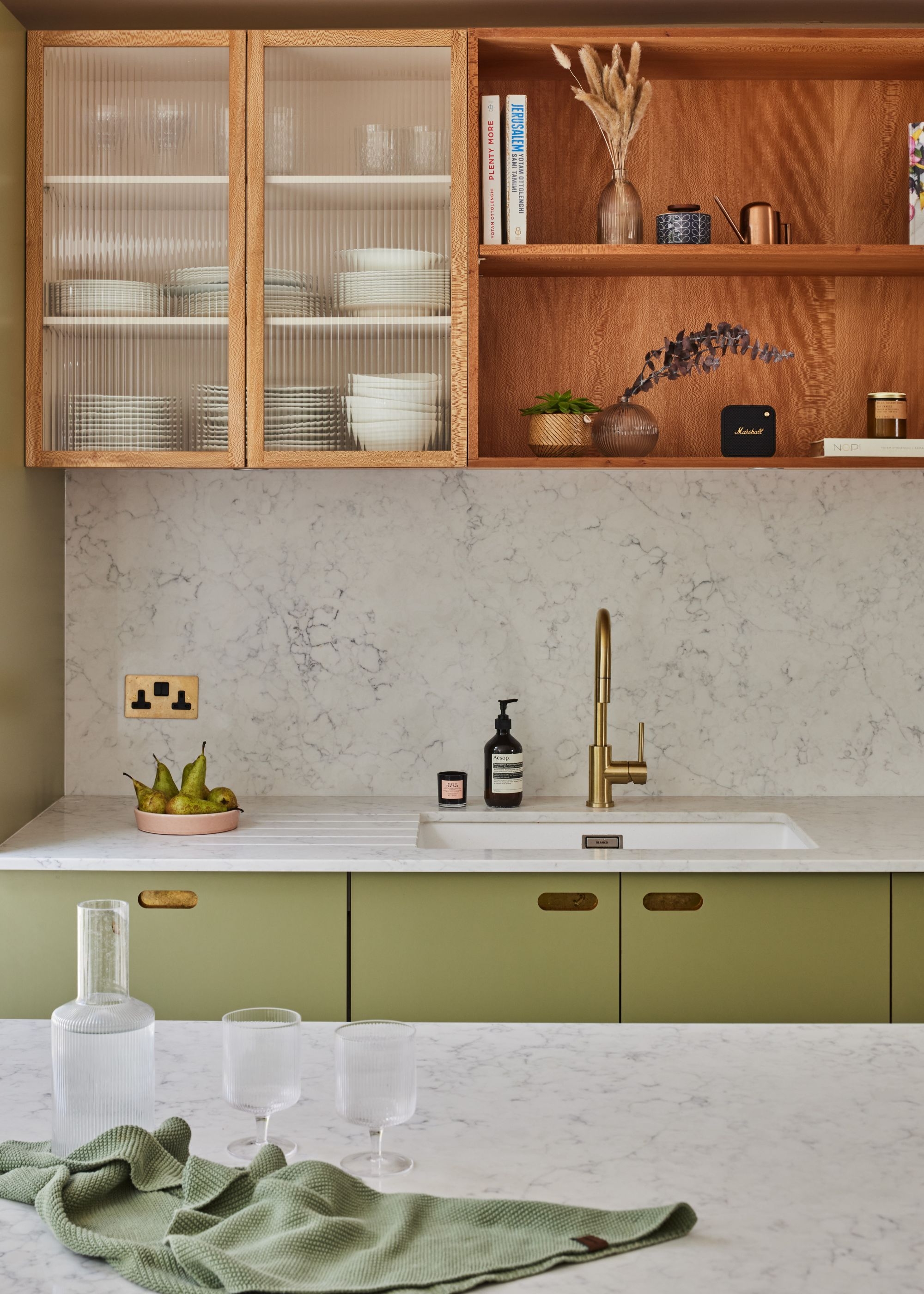 Kitchen Cabinetry with Olive Green Base Marble Top