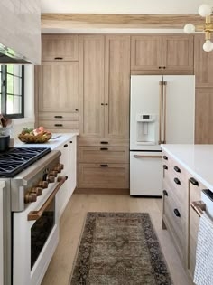 Kitchen Cabinets: Vintage Medallion Rug Bronze Appliance Handles