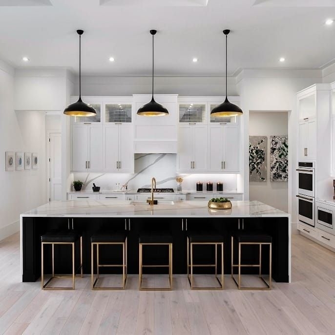 Kitchen Island and Gold Stool Frames with White Marble Backsplash