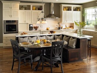 Kitchen Island Banquette With Oval Pedestal Table & Seating