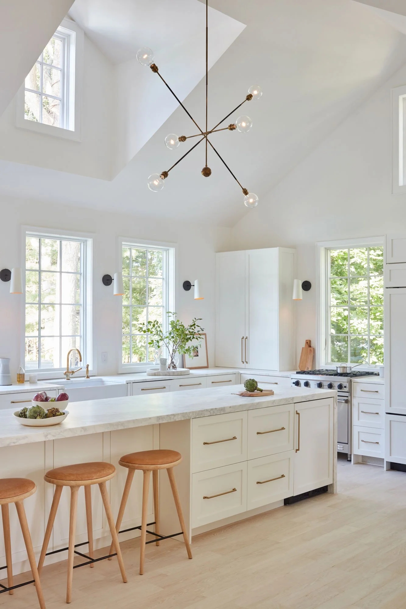 Kitchen Island with Sputnik Chandelier: scandinavian farmhouse kitchen.