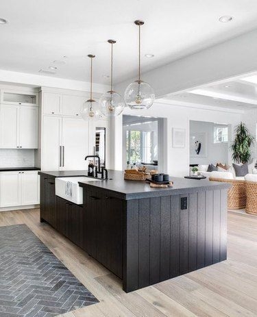 Kitchen Island with Vertical Slat Island and Glass Globe Pendants