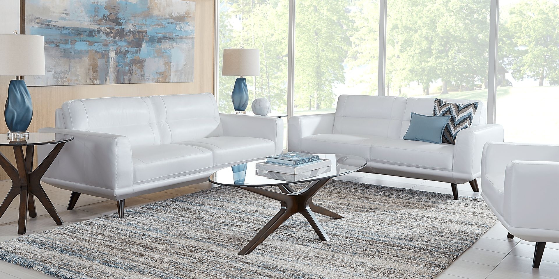 Living Room Set featuring Sculptural Table Bases and Tapered Legs
